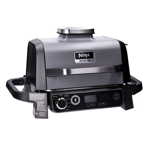 Produktbild Ohne Kategorie - Ninja Woodfire Elektrischer Outdoor Grill & Smoker OG701DE mit 2400 W